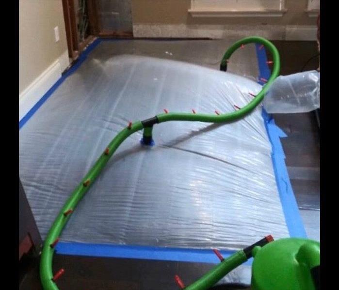 Tent on floor to remove water