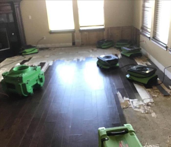Air movers on partially demoed floor.